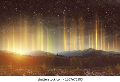 Beautiful Colorful Light Pillars At Night Over The Mountains