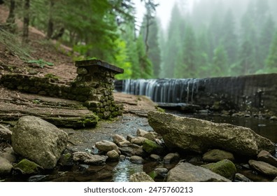 A beautiful, colorful misty morning in Norway at the waterfall.  Misty landscape. Calm scenery - Powered by Shutterstock