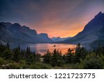 Beautiful colorful sunset over St. Mary Lake and wild goose island in Glacier national park, Montana, USA