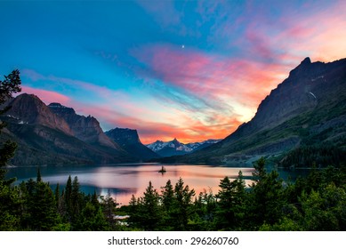 Beautiful colorful sunset over St. Mary Lake and wild goose island in Glacier national park