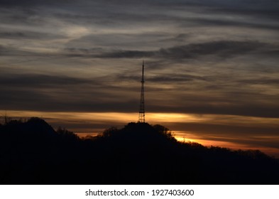 Beautiful and colorful sunset with a visible spire on the horizon.Decline before the storm and storm. - Shutterstock ID 1927403600