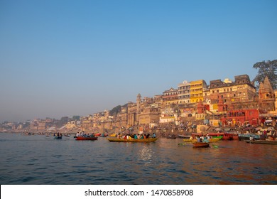 Beautiful and colorful Varanasi famous Dashashwamedh Ghat from Ganga river while ferrying during a sunrise time on a boat, Varanasi, Uttar Pradesh, India - Shutterstock ID 1470858908