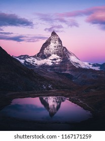 Beautiful and colourful sunrise and reflection of Matterhorn mountain at Riffelsee, Zermatt Switzerland.