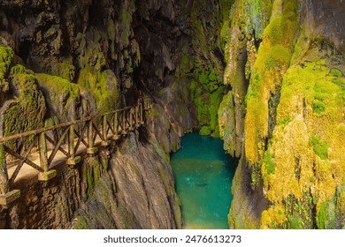 Beautiful colours inside the Iris Grotto at the Cola de Caballo Waterfall in the Monasterio de Piedra Natural Park, Aragon - Powered by Shutterstock