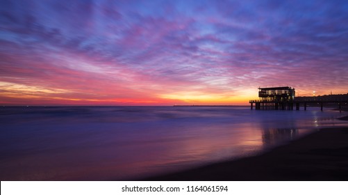 The beautiful colours of the sun rising over Durban's South Beach, Durban, South Africa
