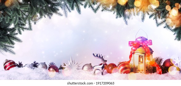 Beautiful composition with vintage Christmas lantern and festive decorations on snow against color background, banner design. Bokeh effect