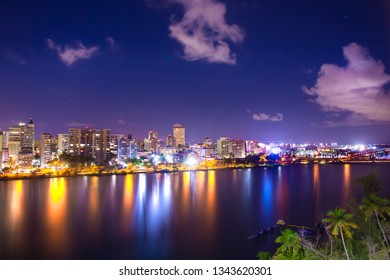  Beautiful Condado Beach, San Juan Puerto Rico Seen At Night With Bay, Buildings And Lights