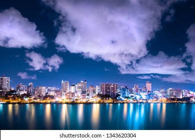  Beautiful Condado Beach, San Juan Puerto Rico Seen At Night With Bay, Buildings And Lights