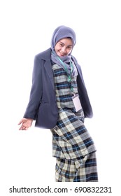 A Beautiful, Confident Muslim Woman With A Serious Expression  Wearing Hijab, Suit And Wearing A Blank ID Tag Or Name Card On A Lanyard  Holding Cell Phone Isolated On White Background.