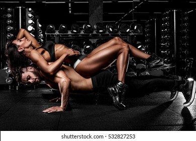 Beautiful Couple In The Fitness Gym