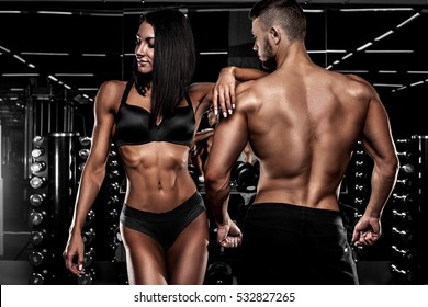 Beautiful Couple In The Fitness Gym