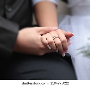 beautiful couple hands of a guy and a girl - Shutterstock ID 1194975022
