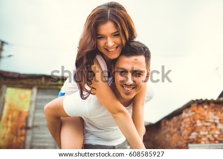 beautiful couple in love hugging outdoors