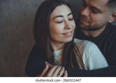 Beautiful Couple In Love Posing In The Studio At Home, On A White And Black Background, Hugs, Kisses, Love, Laughter, Joy, Large Portraits, Jacket, Winter, Jeans, Hipsters, Beard, Hair, Beautiful Coup