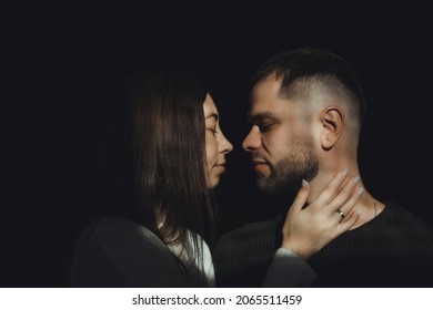 Beautiful Couple In Love Posing In The Studio At Home, On A White And Black Background, Hugs, Kisses, Love, Laughter, Joy, Large Portraits, Jacket, Winter, Jeans, Hipsters, Beard, Hair, Portrait