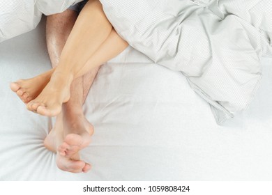 beautiful couple lying together on the bed