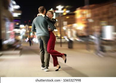 Beautiful Couple On A Date In A Night City Outdoor
