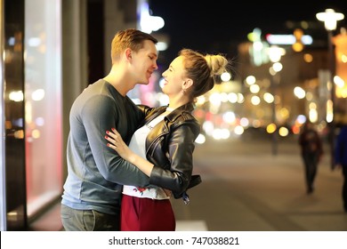 Beautiful Couple On A Date In A Night City Outdoor
