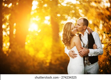 beautiful couple posing on a background autumn forest - Shutterstock ID 274234325