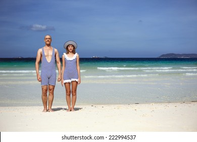 Beautiful Couple In Retro Swimsuit On The Beach