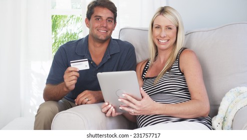 Beautiful Couple Smiling After Buying Baby Supplies