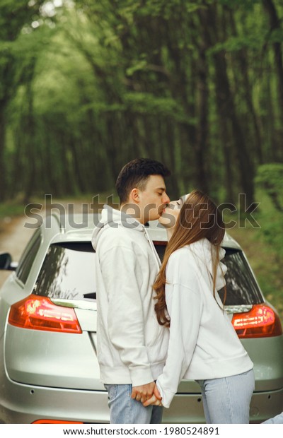 Beautiful couple\
spend time in a spring\
forest