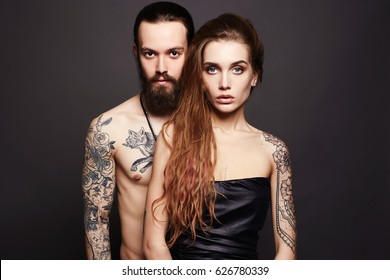 Beautiful Couple With Tattoo.sexy Woman And Handsome Man.lovely Boy And Girl