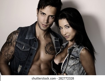 Beautiful Couple Wearing A Jeans Jacket