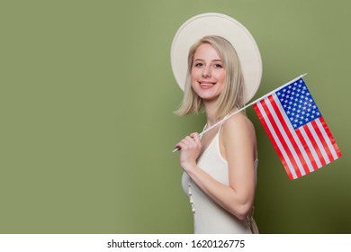 Beautiful Cowgirl In A Hat With United States Of America Flag