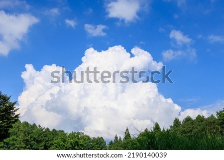 Beautiful cumulonimbus and blue sky from Tugaike plateau in summe