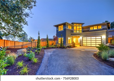Beautiful curb appeal of a Modern craftsman style home, sunset time. Northwest, USA