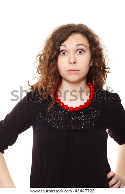 Beautiful Curly Brunette Shows Surprising Looking Stock Photo (Edit Now