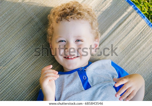 Beautiful Curlyhaired Boy Blond Hair Blue Stock Photo Edit Now