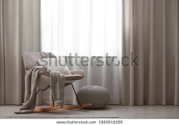 Beautiful
curtains on window in stylish room
interior