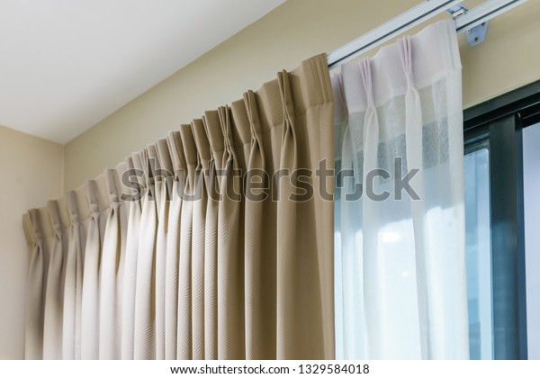 Beautiful curtains with ring-top rail, Curtain\
interior decoration in living\
room