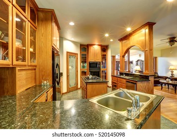 Beautiful Custom Designed Kitchen Room With Gorgeous Granite Counter Tops, Kitchen Island, Pantry And Glass-front Cabinets. Northwest, USA