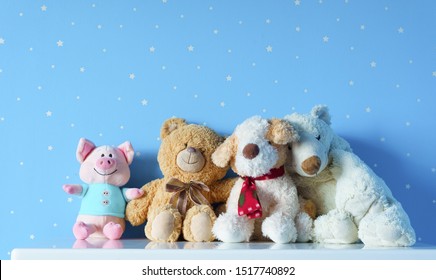 Beautiful Cute Family Toys On The Table In Light Blue Starry Room