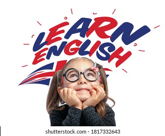 Beautiful Cute Little Girl Curiously Looking At Learn English Text And UK Flag Above Her Head. Learning English Of K-12 Student Concept On White Background.