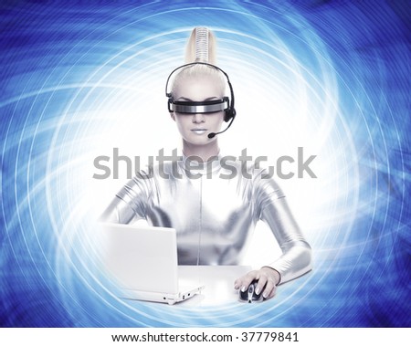 Beautiful cyber woman working on her laptop