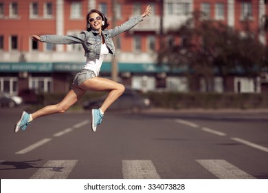 Beautiful Dancing Girl On A Street