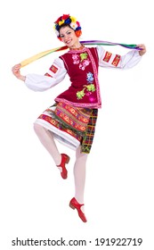 Beautiful Dancing Girl In Ukrainian Polish National Traditional Costume Clothes Happy Smile, Full Length Portrait Isolated Over White Background