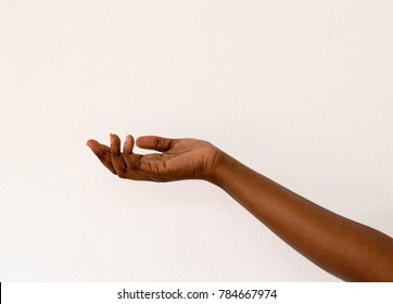 Beautiful Dark Brown Skin Woman's Hand Open Palm And Arm Isolated On White Background 