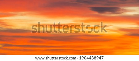 Beautiful dark orange sky evening beauty and Clouds at sunset. Natural