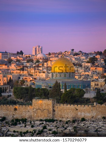 Beautiful dawn light over the Old City Jerusalem: Jewish Quarter buildings, Hurva synagogue, the Temple Mount with Dome of the Rock and the cemetery in front of Golden/Mercy Gate Stock photo © 