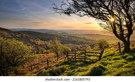 Beautiful dawn in a rural area. Rural sunrise landscape. Hill valley village at dawn. Countryside area at dawn - Shutterstock ID 2161805793