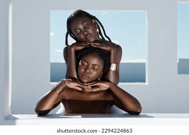 Its a beautiful day. Cropped shot of two attractive young women posing outside.