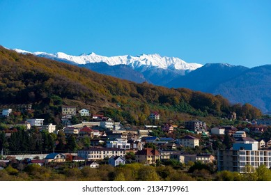 Beautiful daylight scenery of snowy Caucasus mountains. Sochi, Adler - Shutterstock ID 2134719961