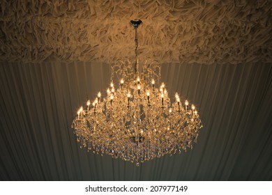 Beautiful and dear modern chandelier in living room