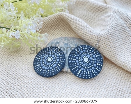 Beautiful decent  vintage glamour  handmade earrings with elegant background.