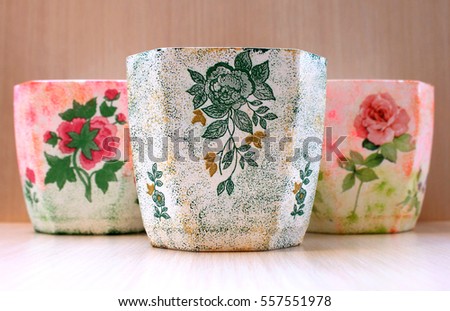 Beautiful decorative flowerpot handmade with decoupage style 